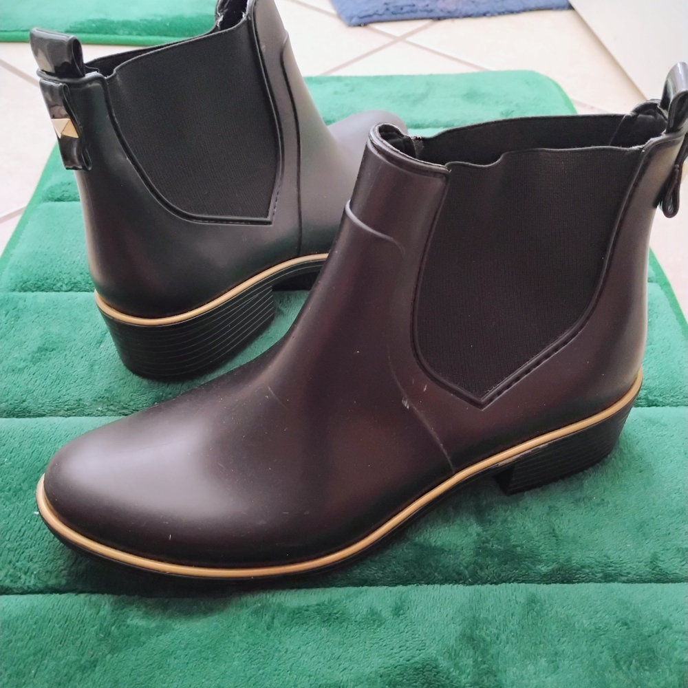 kate spade Black Rain Chelsea Boots with Gold Trim